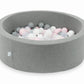Mimii-Piscine-à Balles-90x30-grise-avec-boules-200-pièces-transparent-blanc-gris-rose-clair